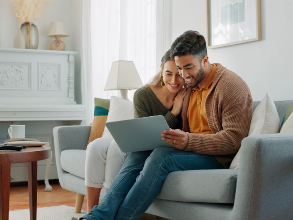 happy-couple-relax-on-sofa-with-laptop-hug-and-search-networking-or-social-media-in-home.jpg?s=1024x1024&w=is&k=20&c=03rFimqA3abUMFeHK_0_Or4BMLP-WfNXUWXdKwFRNRI=